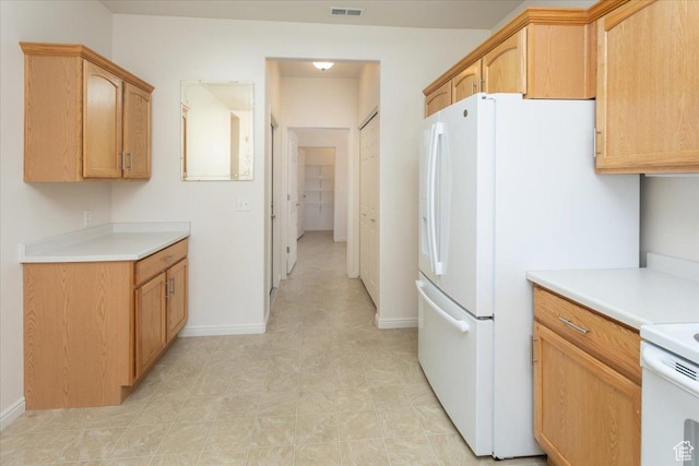 2896 W Abbey Springs Cir S, West Jordan, UT 84084 - kitchen with white appliances, light countertops, baseboards, and visible vents