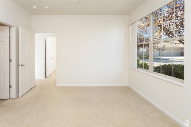 2896 W Abbey Springs Cir S, West Jordan, UT 84084 - spare room featuring light carpet and baseboards