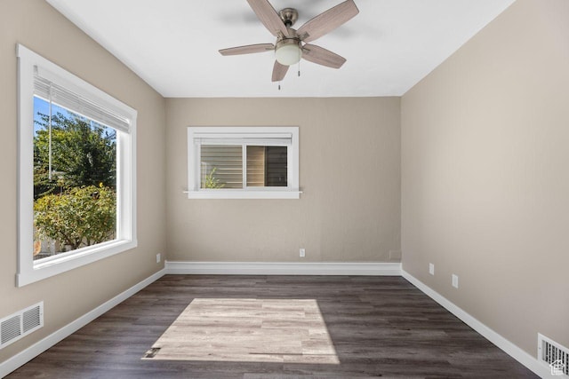327 E Coatsville Ave S, Salt Lake City, UT 84115 - spare room with a ceiling fan, dark wood-style flooring, and baseboards