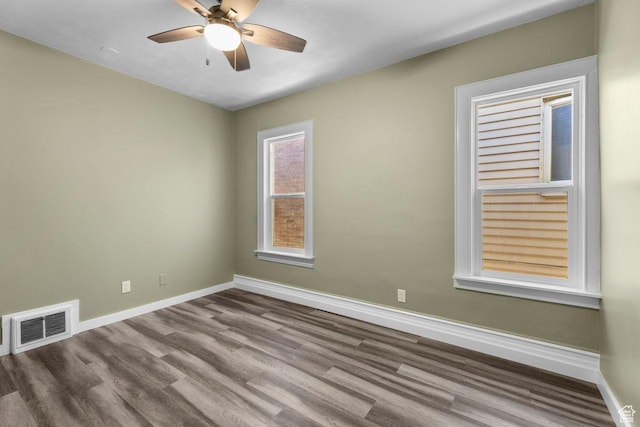327 E Coatsville Ave S, Salt Lake City, UT 84115 - spare room with baseboards, wood finished floors, and a ceiling fan