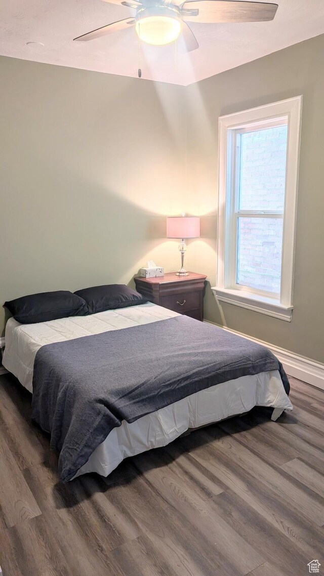 327 E Coatsville Ave S, Salt Lake City, UT 84115 - bedroom with wood finished floors, baseboards, and ceiling fan