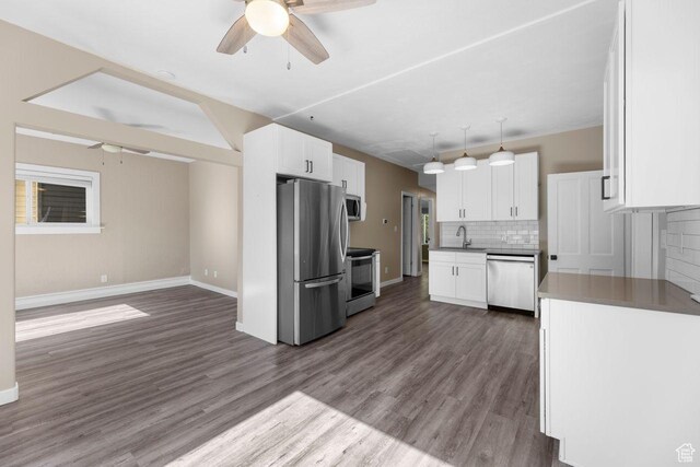 327 E Coatsville Ave S, Salt Lake City, UT 84115 - kitchen featuring appliances with stainless steel finishes, ceiling fan, tasteful backsplash, and dark wood finished floors