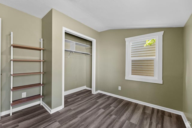 327 E Coatsville Ave S, Salt Lake City, UT 84115 - unfurnished bedroom featuring dark wood-style floors, baseboards, a closet, and lofted ceiling