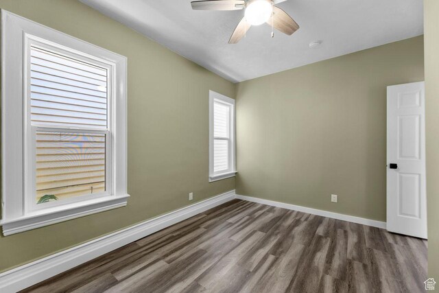 327 E Coatsville Ave S, Salt Lake City, UT 84115 - empty room with wood finished floors, ceiling fan, baseboards, and a smoke detector