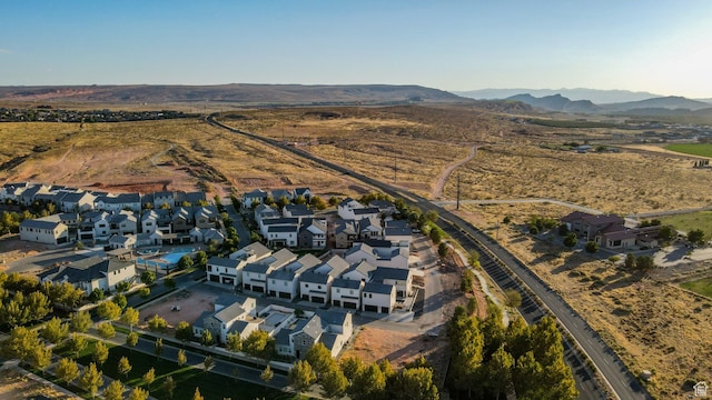 aerial view featuring a mountain view and a residential view