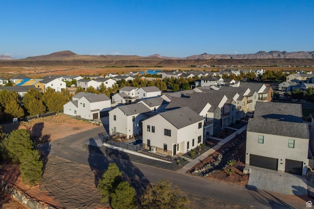 drone / aerial view featuring a mountain view and a residential view