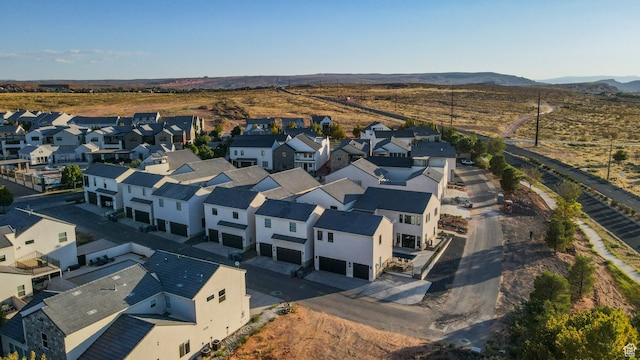 drone / aerial view with a mountain view and a residential view