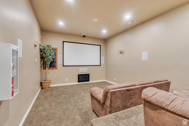 376 S 740 W Unit 102, Pleasant Grove, UT 84062 - carpeted home theater with recessed lighting, a glass covered fireplace, visible vents, and baseboards
