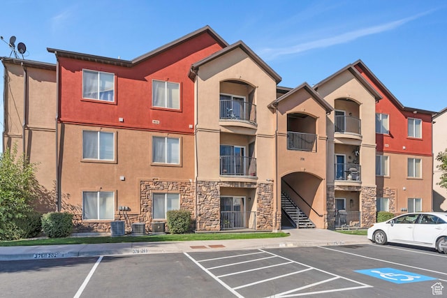 376 S 740 W Unit 102, Pleasant Grove, UT 84062 - view of property with uncovered parking and central AC unit