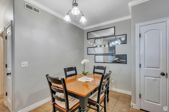376 S 740 W Unit 102, Pleasant Grove, UT 84062 - dining room featuring visible vents, baseboards, ornamental molding, and light tile patterned floors