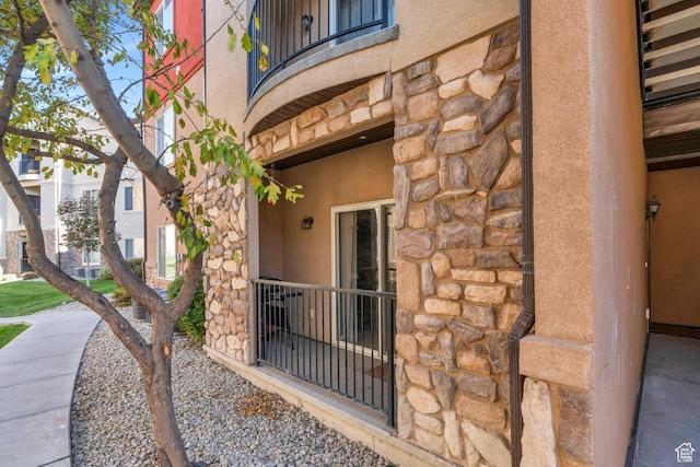 376 S 740 W Unit 102, Pleasant Grove, UT 84062 - view of exterior entry featuring stone siding and stucco siding