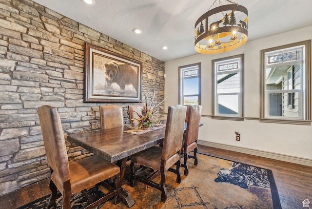 8938 N Canyon Wash Dr, Eagle Mountain, UT 84005 - dining area featuring recessed lighting, an inviting chandelier, a textured ceiling, wood finished floors, and baseboards