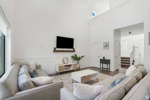 7152 N Brook Rdg, Eagle Mountain, UT 84005 - living room with a high ceiling and wood-type flooring