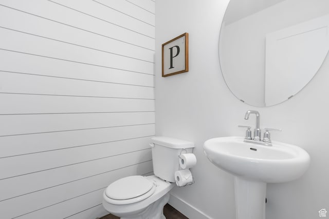 7152 N Brook Rdg, Eagle Mountain, UT 84005 - bathroom featuring toilet and wooden walls