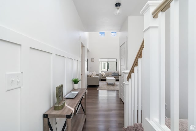 7152 N Brook Rdg, Eagle Mountain, UT 84005 - hall featuring a high ceiling and dark hardwood / wood-style flooring