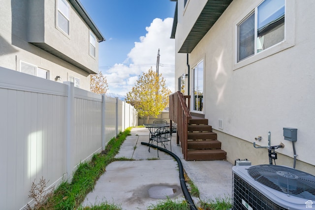 7152 N Brook Rdg, Eagle Mountain, UT 84005 - view of patio featuring central AC unit