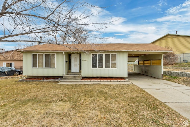 10551 Violet Dr, Sandy, UT 84094 - single story home featuring an attached carport, driveway, and roof with shingles