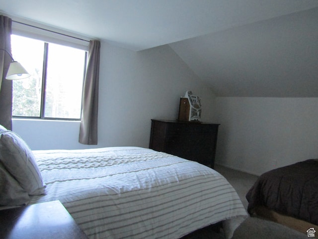 102 S Alpine Ln # A-4, Brian Head, UT 84719 - carpeted bedroom with vaulted ceiling
