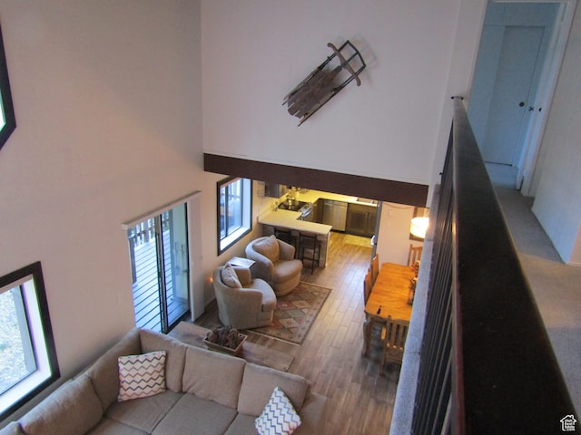 102 S Alpine Ln # A-4, Brian Head, UT 84719 - living room featuring wood-type flooring and a high ceiling