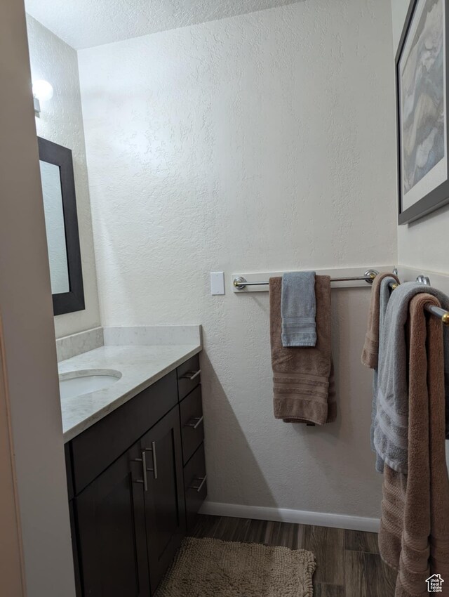 102 S Alpine Ln # A-4, Brian Head, UT 84719 - bathroom with vanity and hardwood / wood-style floors