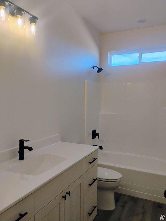 2390 W 5190 N Unit 4, Cedar City, UT 84721 - full bathroom featuring vanity, shower / bathing tub combination, toilet, and hardwood / wood-style flooring