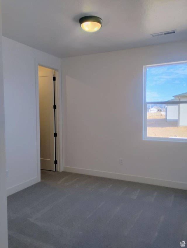 2390 W 5190 N Unit 4, Cedar City, UT 84721 - empty room featuring carpet flooring