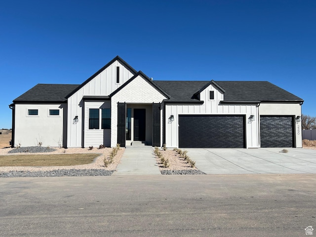 modern farmhouse style home with a garage