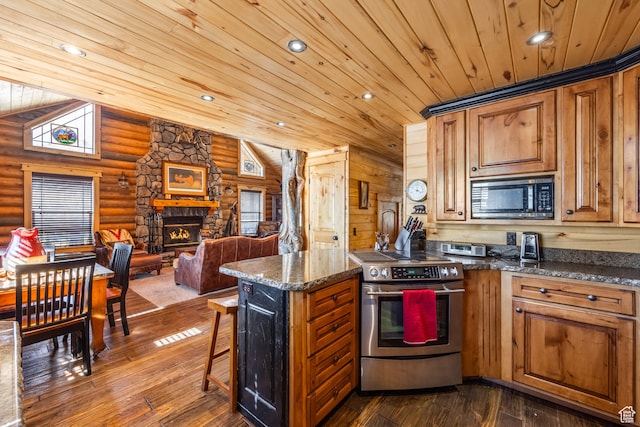 18906 N Canyon Rd, Whiterocks, UT 84085 - kitchen with dark wood-type flooring, wood ceiling, stainless steel range with electric stovetop, and black microwave