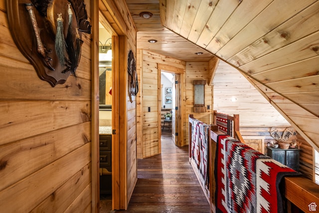 18906 N Canyon Rd, Whiterocks, UT 84085 - corridor featuring wood ceiling, wood walls, vaulted ceiling, and dark hardwood / wood-style floors