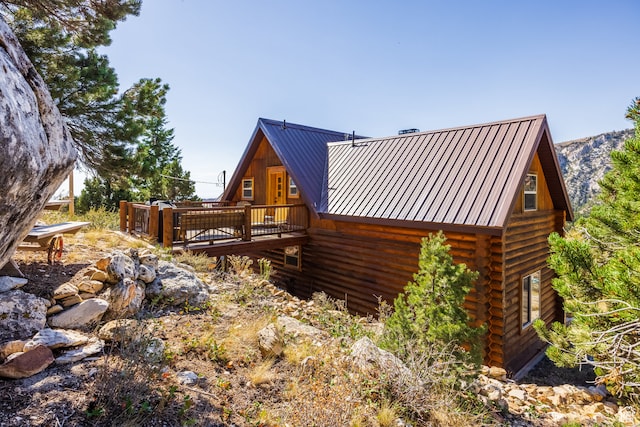 18906 N Canyon Rd, Whiterocks, UT 84085 - view of home's exterior featuring a wooden deck