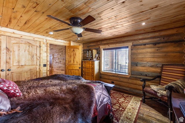 18906 N Canyon Rd, Whiterocks, UT 84085 - bedroom featuring dark wood-type flooring, ceiling fan, wood ceiling, and rustic walls