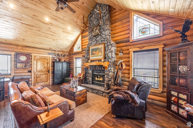 18906 N Canyon Rd, Whiterocks, UT 84085 - living room with high vaulted ceiling, a wealth of natural light, a fireplace, and hardwood / wood-style floors