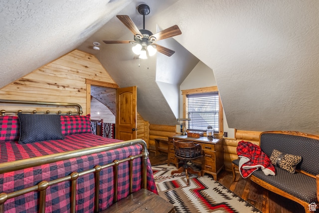 18906 N Canyon Rd, Whiterocks, UT 84085 - bedroom with hardwood / wood-style floors, a textured ceiling, vaulted ceiling, and ceiling fan
