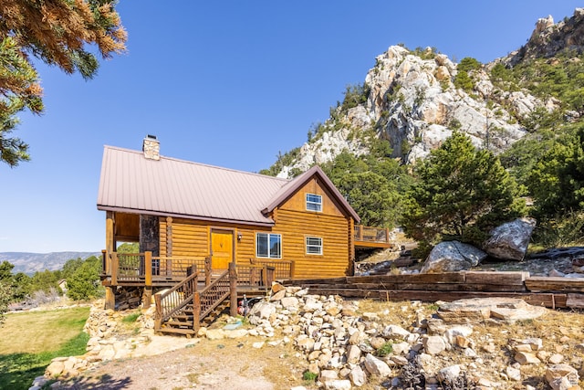 18906 N Canyon Rd, Whiterocks, UT 84085 - back of house with a deck with mountain view