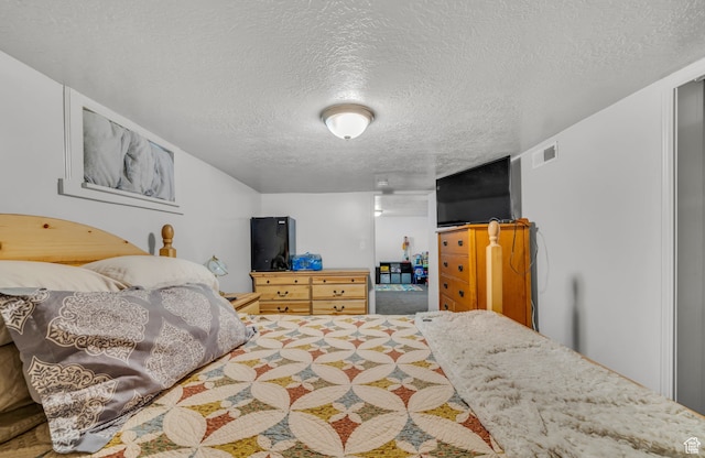 bedroom with a textured ceiling