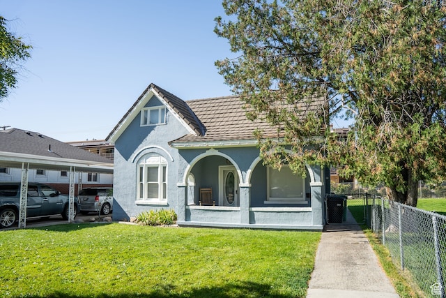 view of front of home with a front yard
