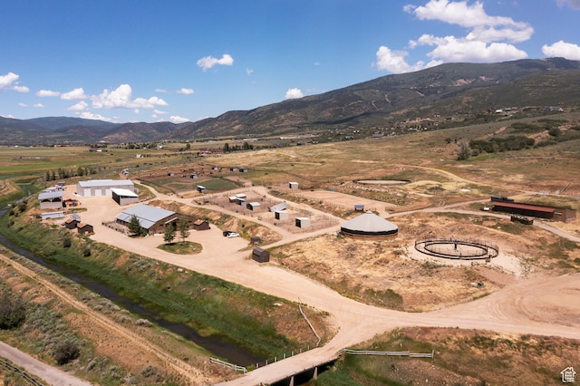 aerial view featuring a mountain view and a rural view