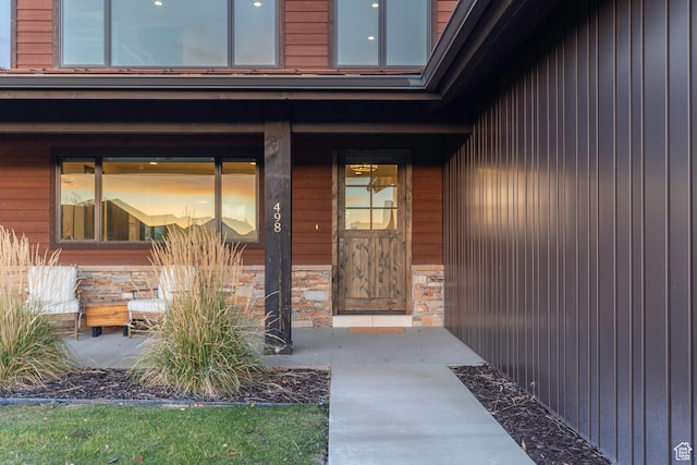 entrance to property with a porch
