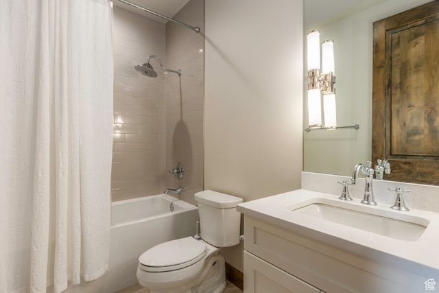 full bathroom featuring vanity, toilet, and shower / bath combo with shower curtain