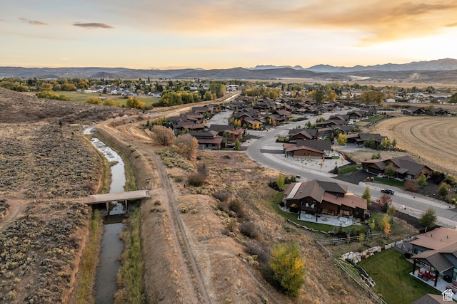 aerial view at dusk with a mountain view