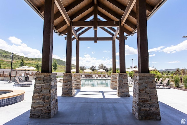 498 Thorn Creek Dr, Kamas, UT 84036 - view of patio / terrace featuring an outdoor pool and a mountain view
