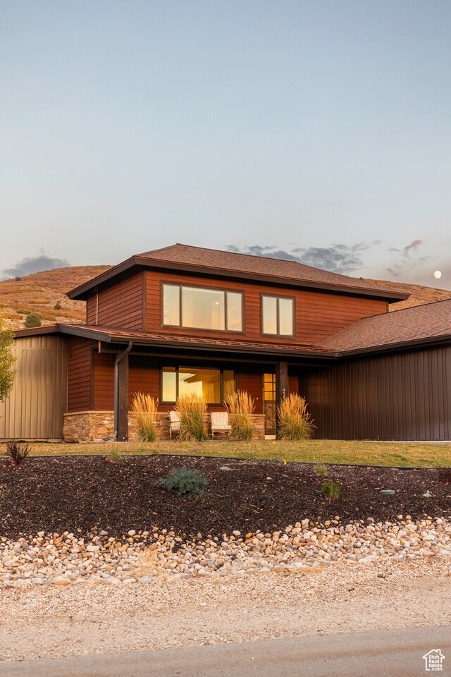 view of property exterior at dusk