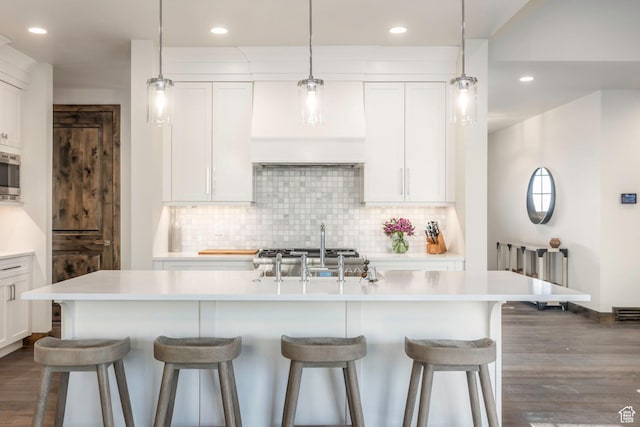 498 Thorn Creek Dr, Kamas, UT 84036 - kitchen with custom exhaust hood, light countertops, backsplash, dark wood finished floors, and white cabinets