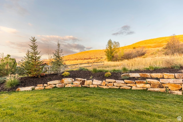 yard at dusk with a mountain view