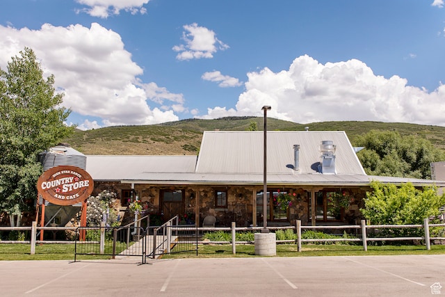 view of building exterior with a mountain view