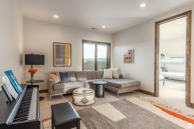living room featuring light carpet