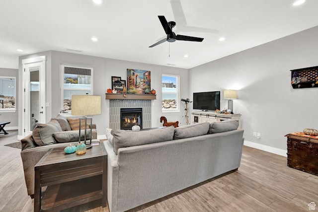 170 E 3900 N, North Ogden, UT 84414 - living area with ceiling fan, a fireplace, baseboards, recessed lighting, and light wood-style flooring