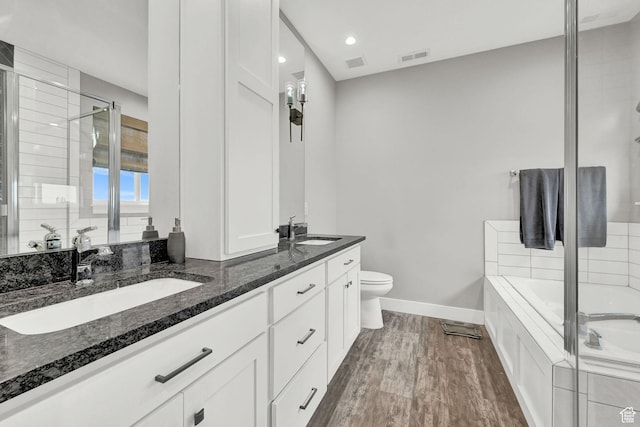 170 E 3900 N, North Ogden, UT 84414 - full bathroom with double vanity, a garden tub, baseboards, toilet, and a shower stall