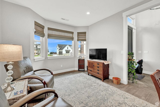 170 E 3900 N, North Ogden, UT 84414 - living area featuring plenty of natural light, baseboards, and recessed lighting