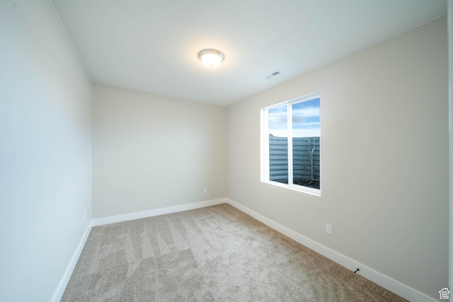 view of carpeted spare room